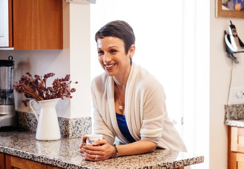 Nataly standing in kitchen